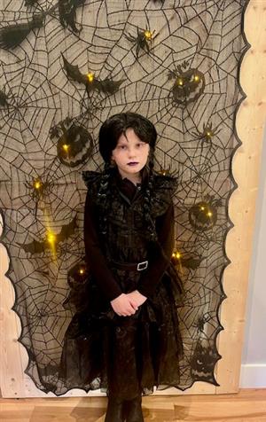 Ages 8-9 Winner: Aria as Wednesday Addams