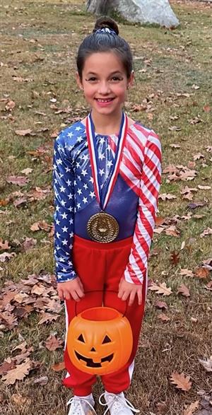 Ages 6-9: Amelia Brey: (Gymnast): Winner